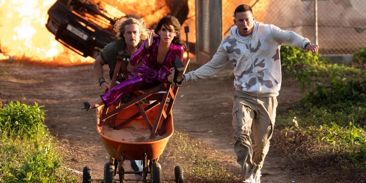Brad Pitt, Sandra Bullock y Channing Tqatum escapando de una explosión